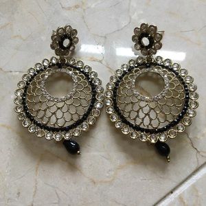 Large jeweled earrings